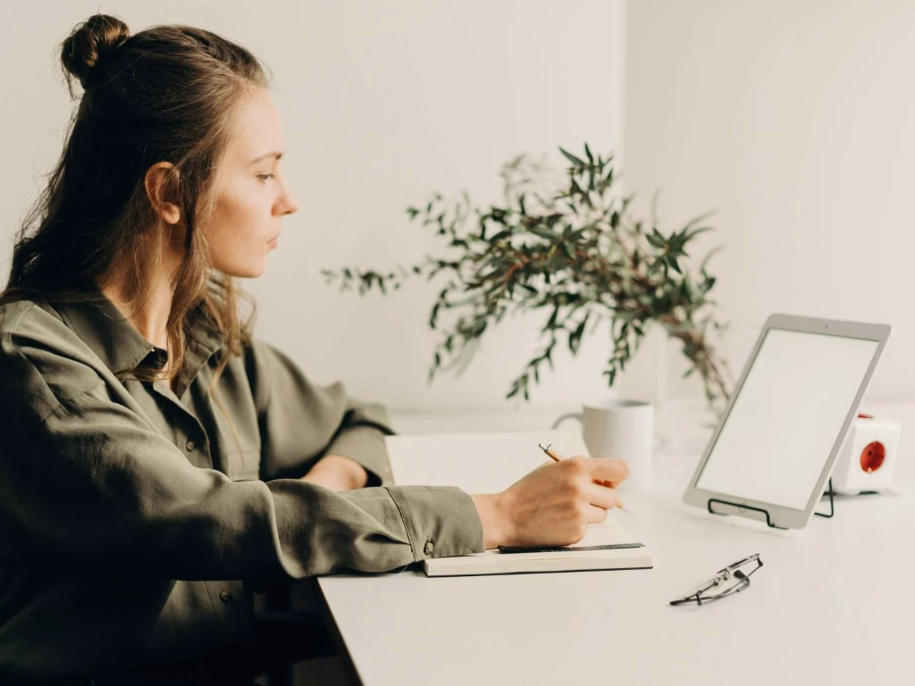 Person at a desk working on a sales funnel.