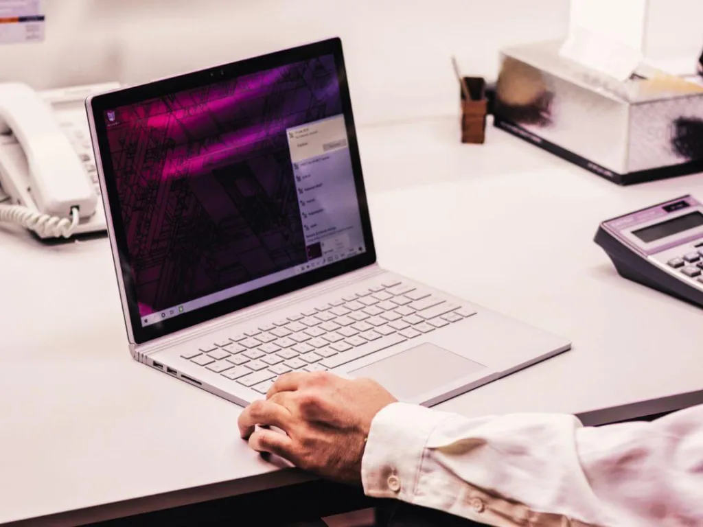 Person a laptop working on a creative business.
