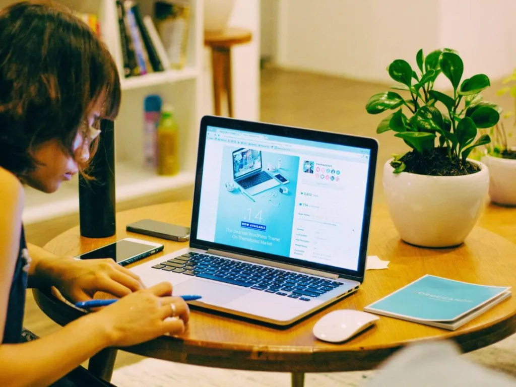 Person a laptop working on a creative business.