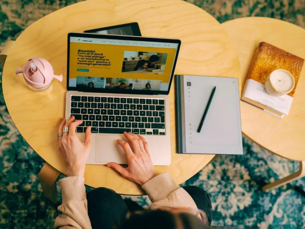 Person on laptop working on niche markets.