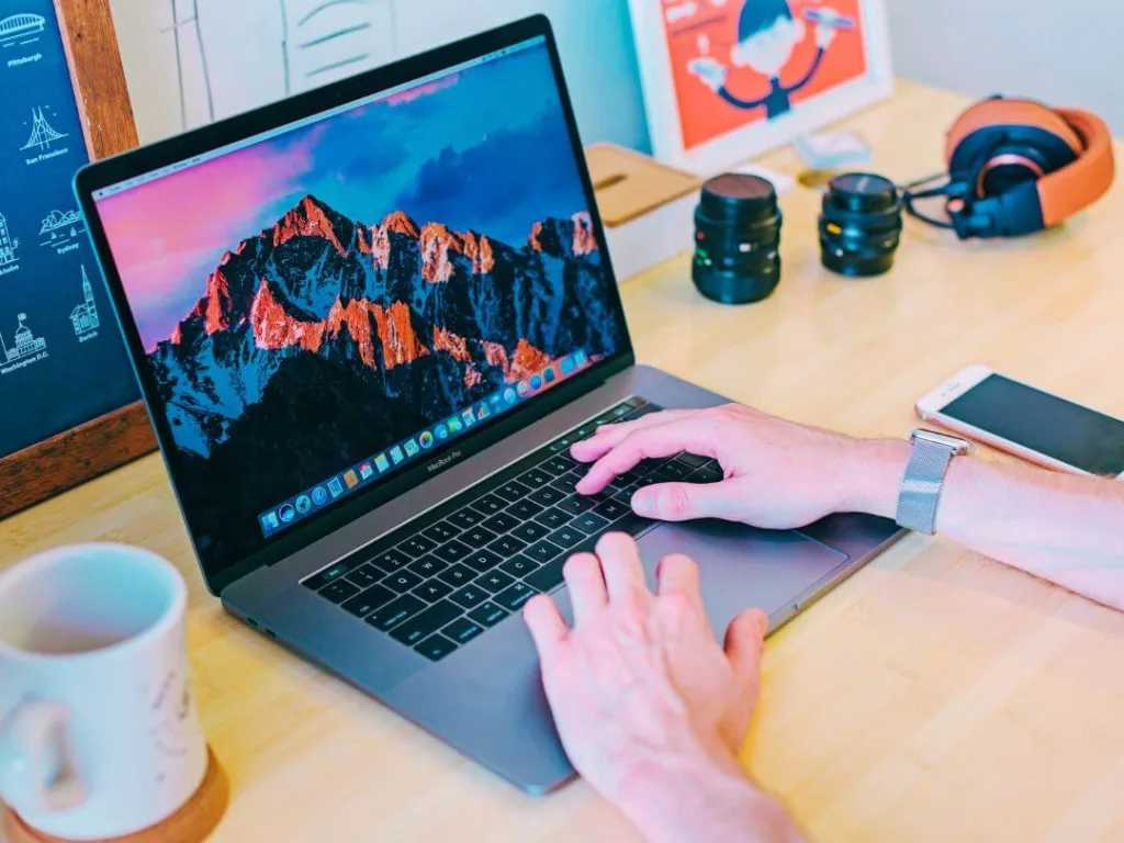 Person on laptop working on niche markets.