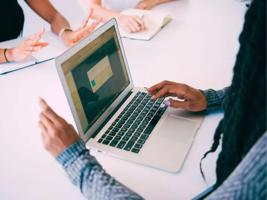 Person on laptop working on faceless marketing on Instagram.