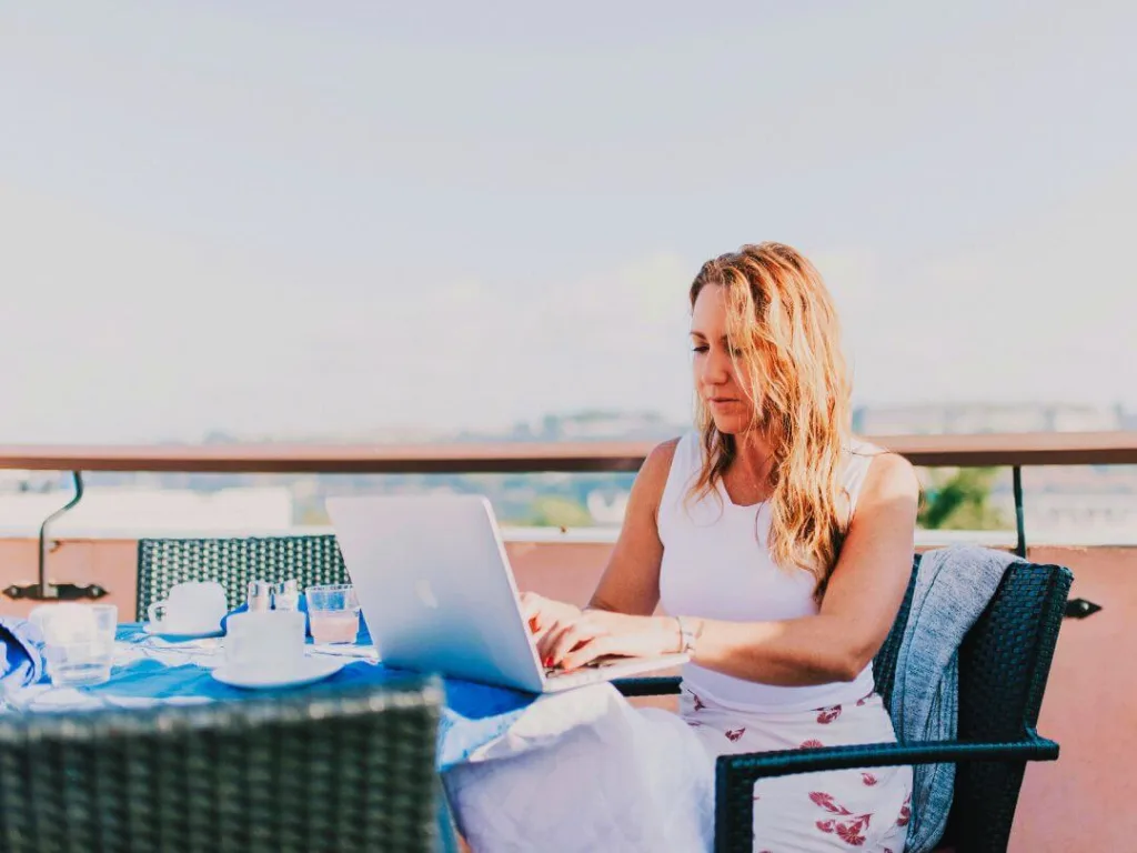 Person on laptop learning about headlines.
