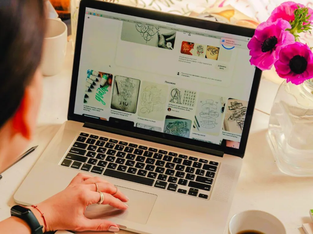 Person laptop working on headlines for their blog.