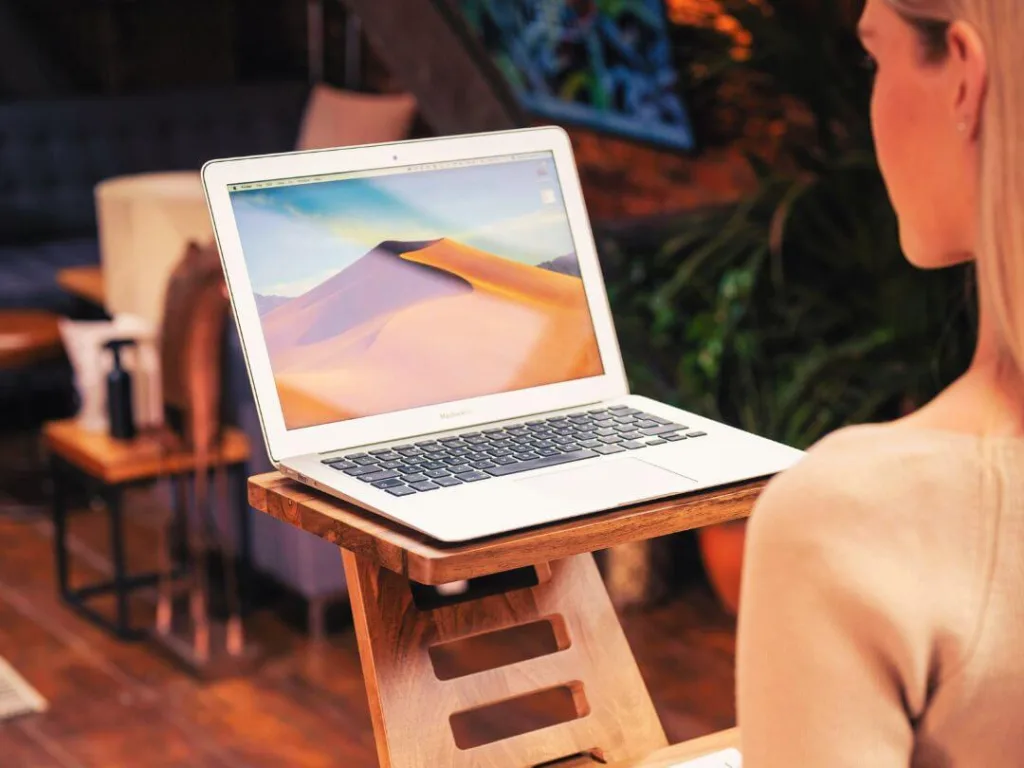 Person laptop working on headlines for their blog.