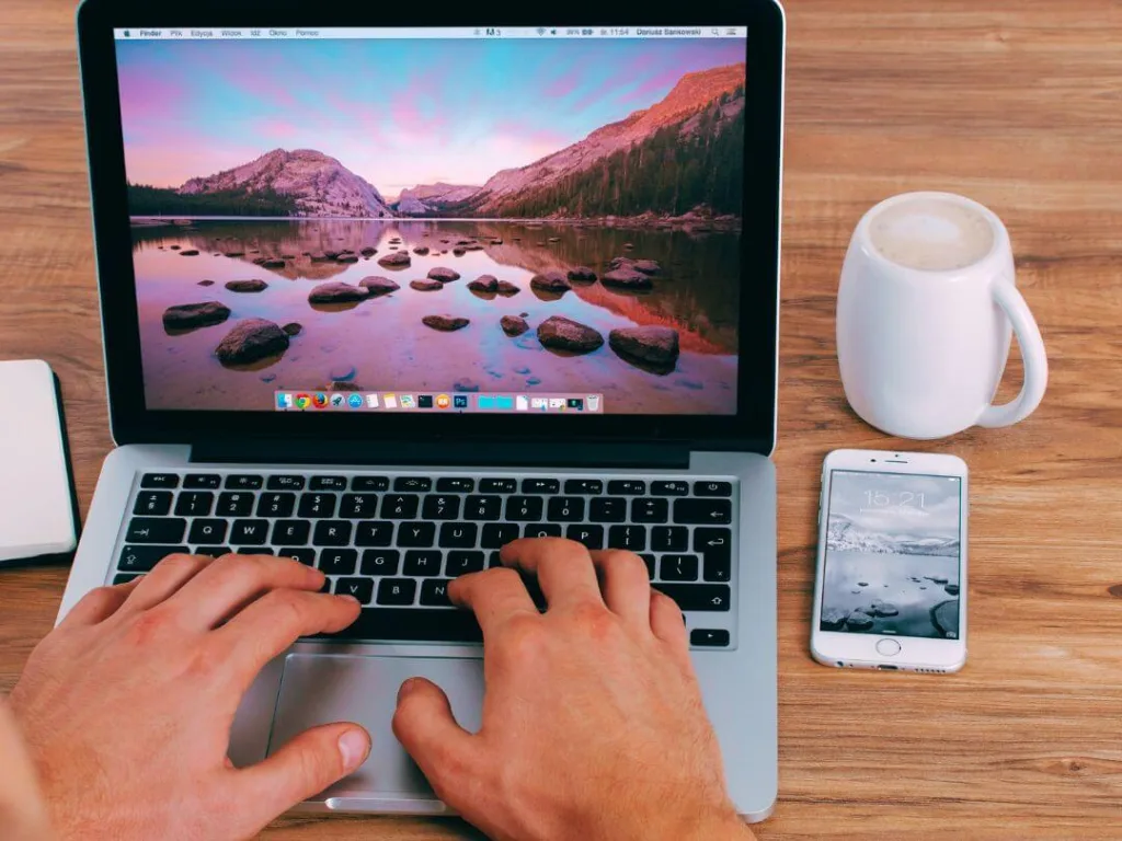 Person on laptop working on content writing.