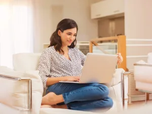 Lead Generation Strategy How to Optimize Your Process 1 1 – Azura Person on laptop working on lead generation strategy.