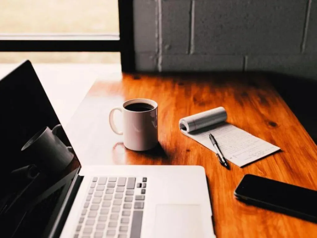 Laptop on desk used for email marketing.