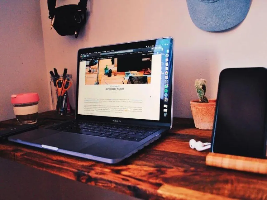 Laptop on desk used for email marketing.