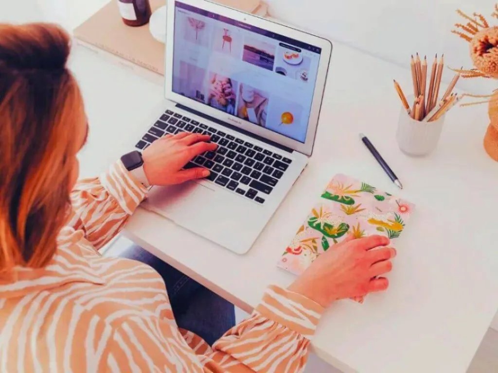 Writing-Magazine-Articles-How-to-Secure-Publishing-2-1 – Azura Person using laptop to write articles.