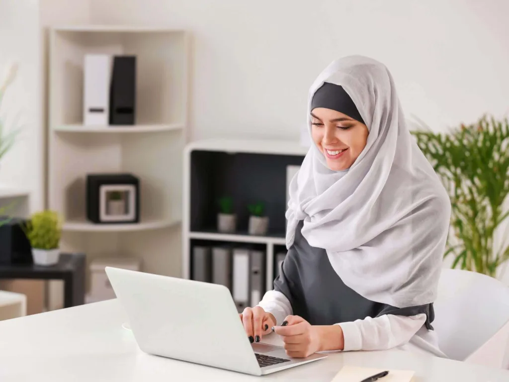 Person using laptop to work on lead capture tools.
