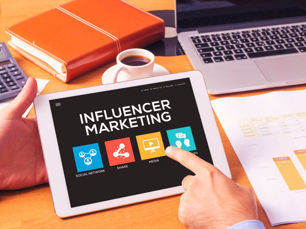 Person at desk working on influencer marketing for tourism.