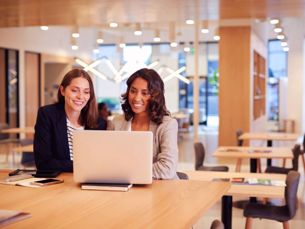 Corporate Branding How to Rebrand Your Company Successfully 2 1 – Azura Person on laptop working on corporate branding.