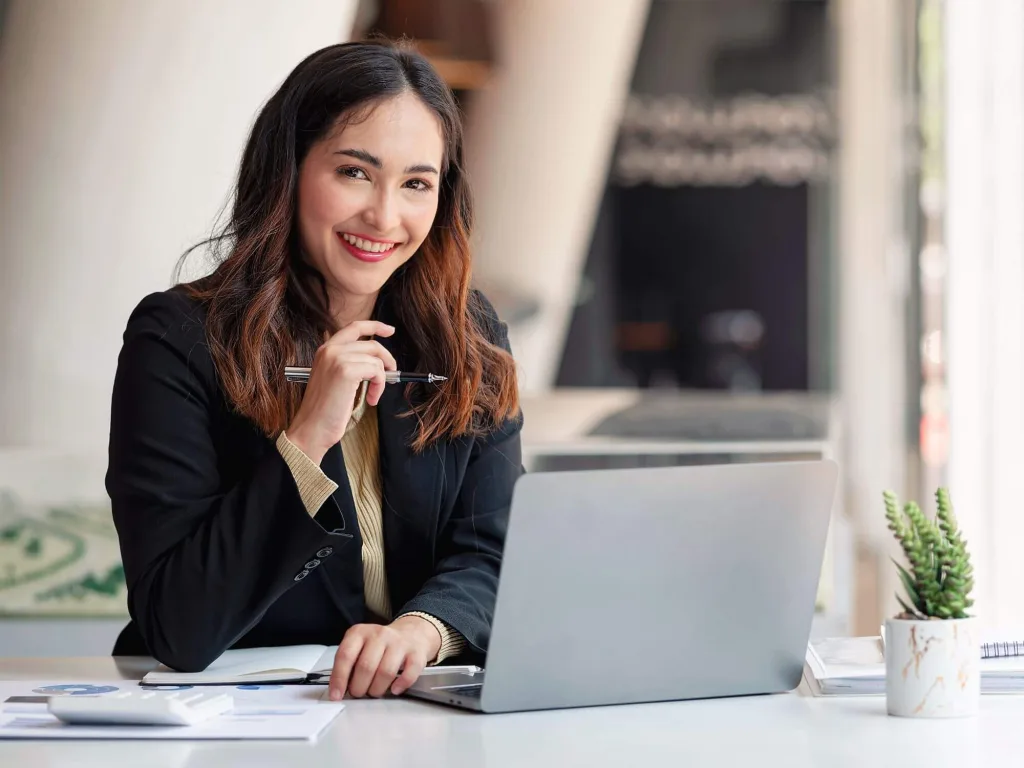 Person using laptop to learn about corporate influencers.